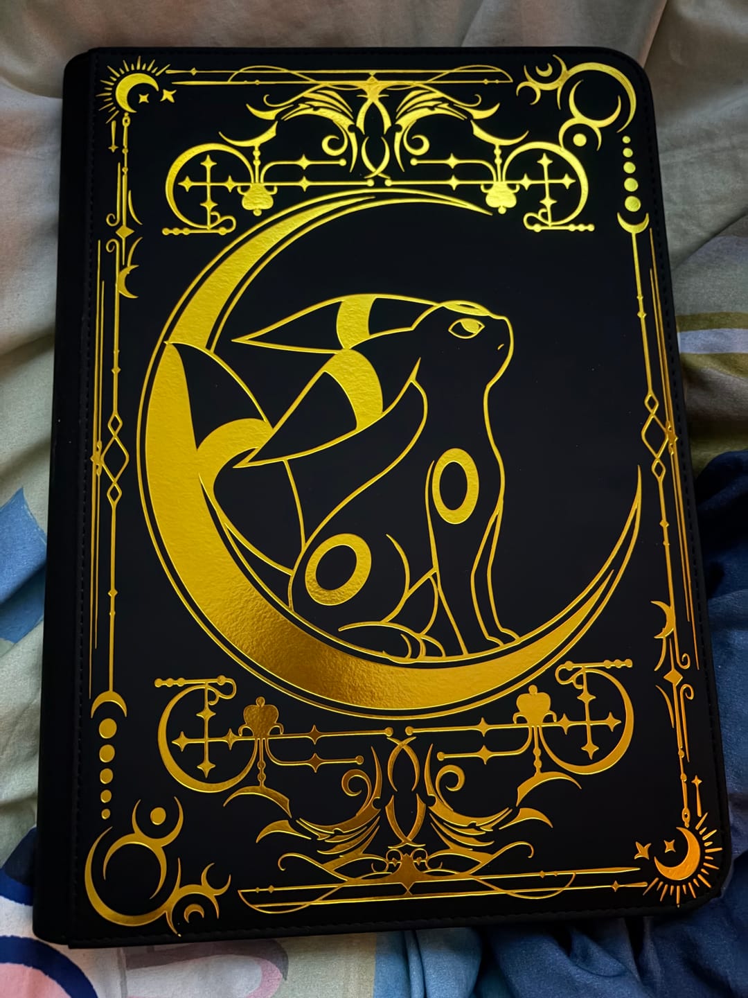 Customer photo review of Lunar Shadow 9-Pocket Trading Card Binder