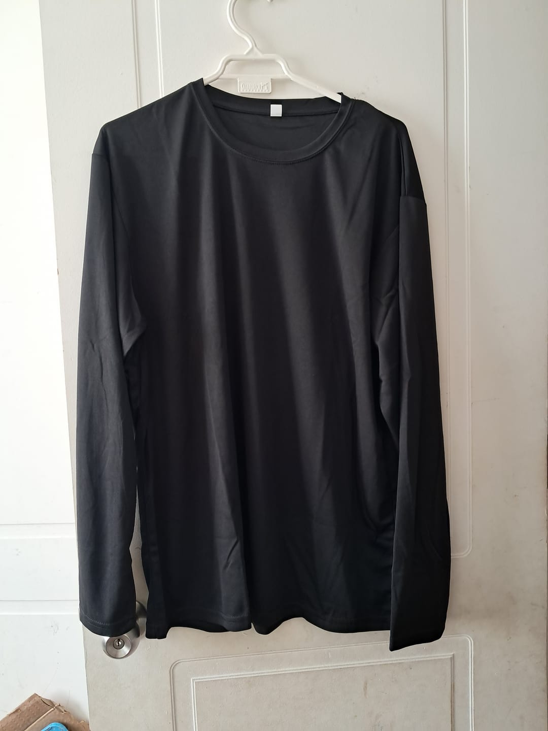 Customer photo review of Polera Adulto Geo Polyprint Manga Larga
