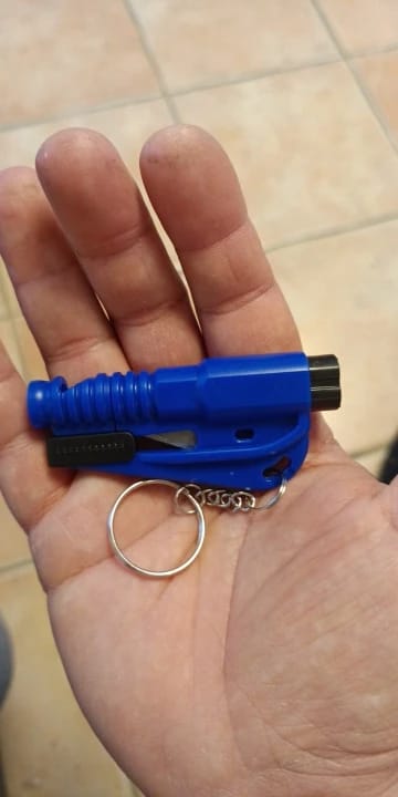 Customer photo review of 3-in-1 Emergency Escape Tool Keychain (Window Breaker & Seatbelt Cutter)