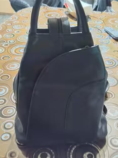 Customer photo review of The Ivy | Cowhide Leather Backpack
