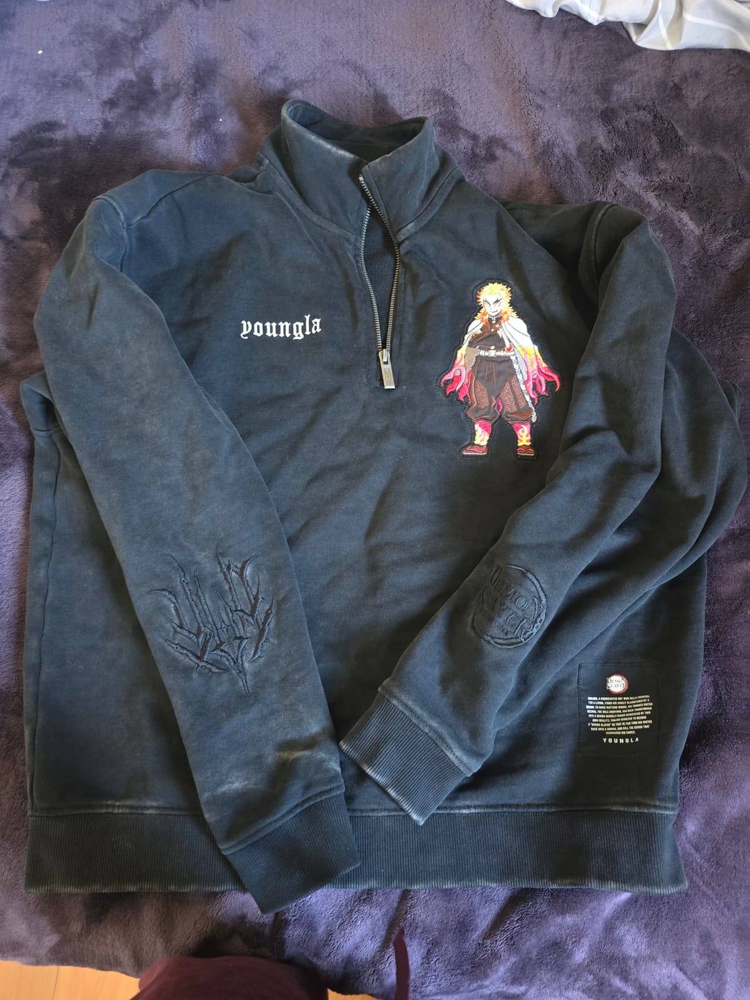 Customer photo review of 5197 - Demon Slayer: Kimetsu no Yaiba - Quarter Zip