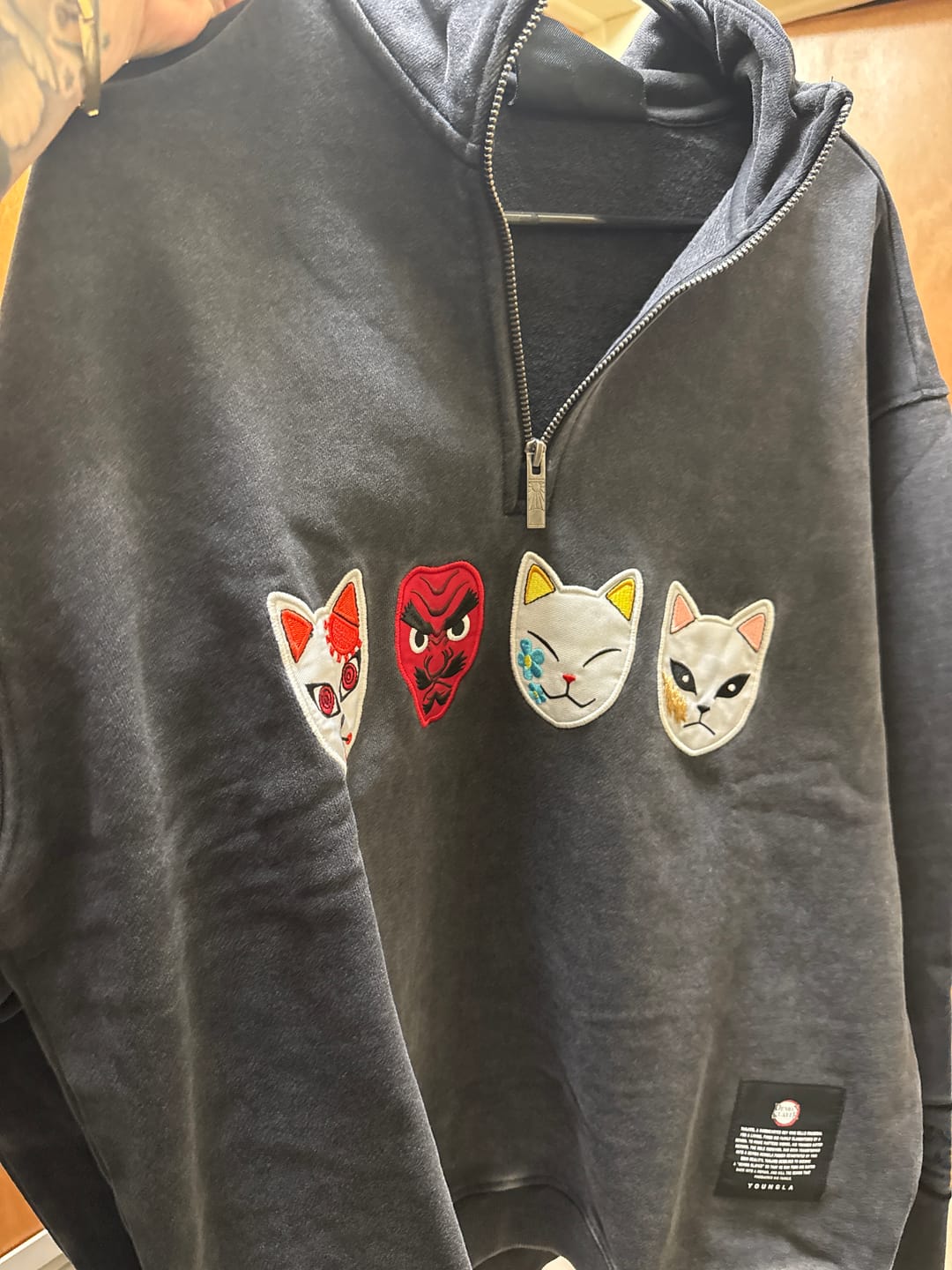 Customer photo review of 5197 - Demon Slayer: Kimetsu no Yaiba - Quarter Zip
