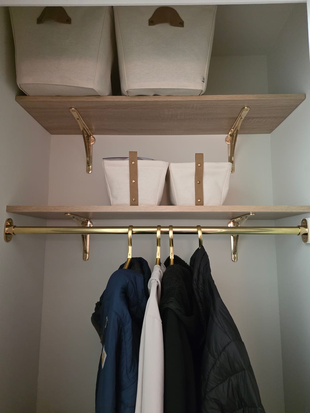Customer photo review of Closet Rod – Unlacquered Polished Brass