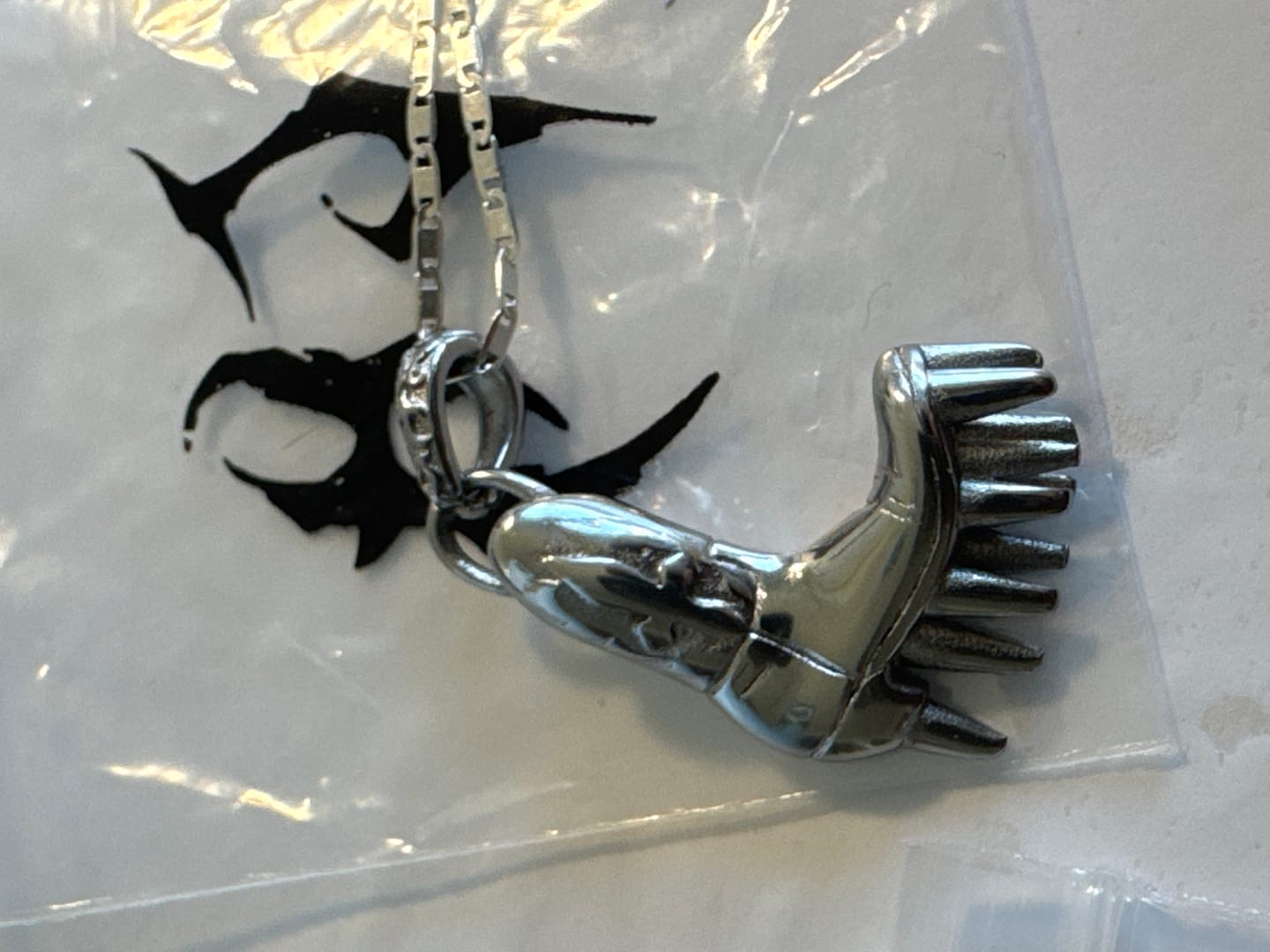 Customer photo review of SPIKE BOOT PENDANT