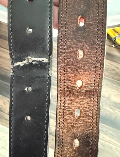 Customer comparing their brown Wyoming Bison belt to a competitor's damaged black belt.