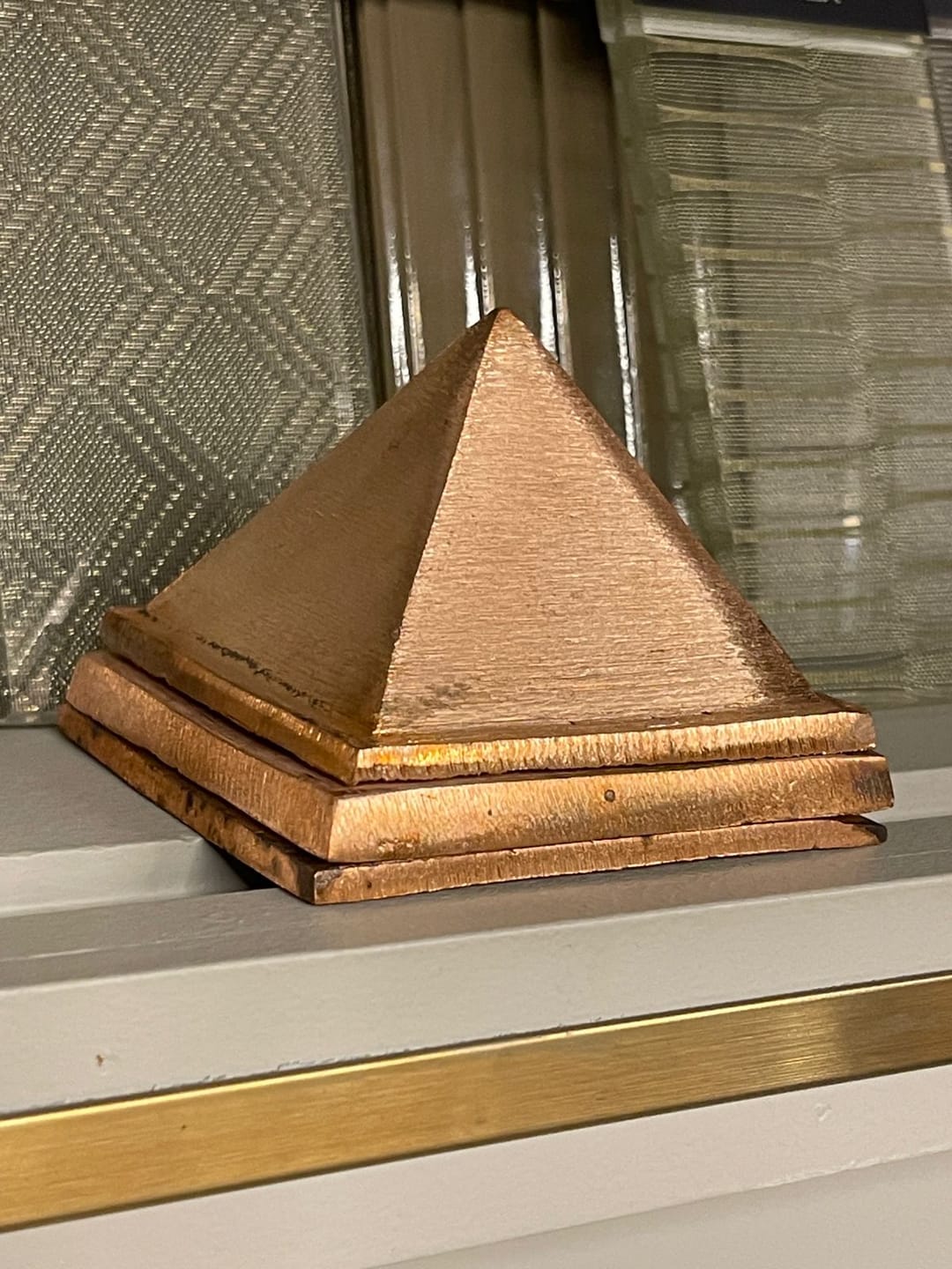 Customer photo review of 3-Layer Copper Pyramid Vastu Remedy for Energy Amplification, Prosperity and South East Direction Activation for Home, Office and Vastu Correction | 5-7.6 cm | 665 g