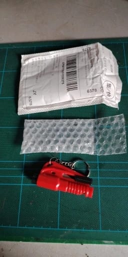Customer photo review of 3-in-1 Emergency Escape Tool Keychain (Window Breaker & Seatbelt Cutter)