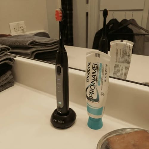 Customer photo review of Exy Red Light Toothbrush