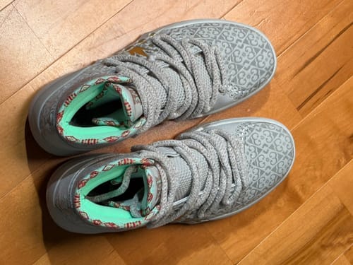 Customer's pair of Joker 2 'Holiday' High shoes, showing the gray patterned upper, thick laces, and mint green lining.
