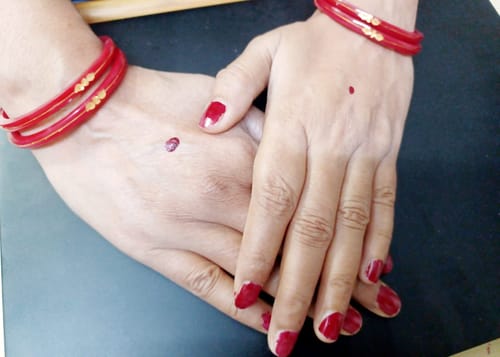 Customer photo review of “22k Hallmark Red Divya Shringar Bangle” (2 pis)