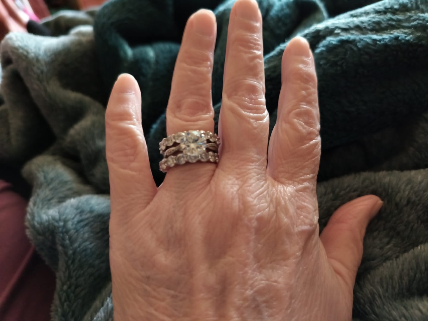 Customer photo review of Round Sona Diamond Sterling Silver Wedding Band Eternity Ring
