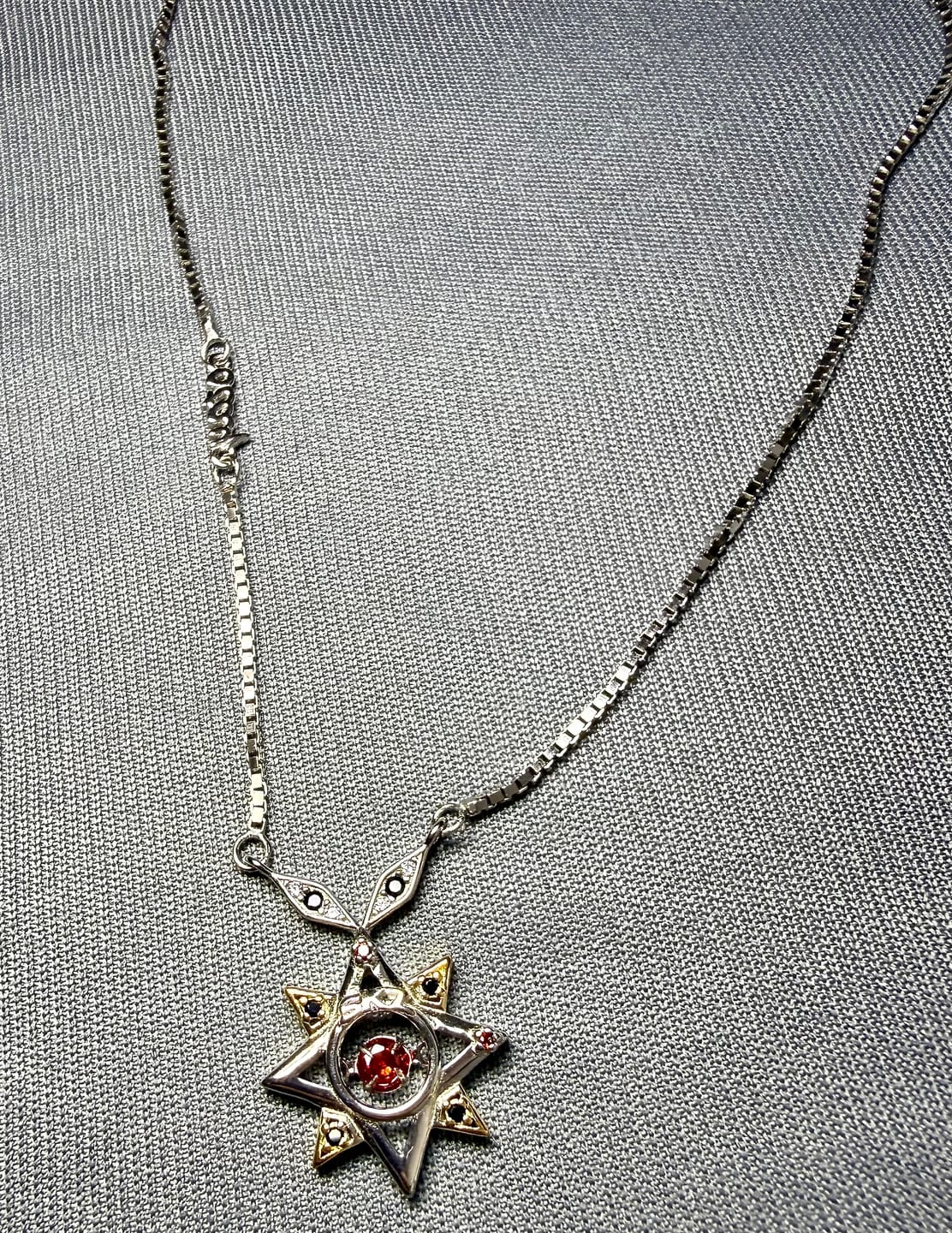Customer photo review of SKZ & Ateez dancing gem necklaces