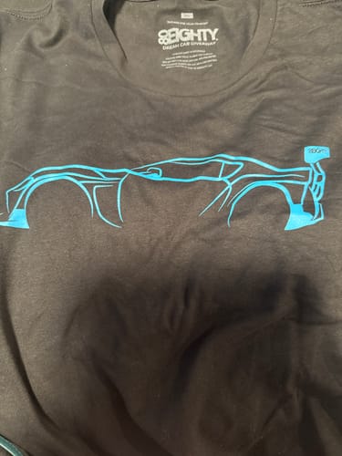 Customer's dark 80Eighty® DCG87 Shirt showing the bright blue car graphic on the chest.