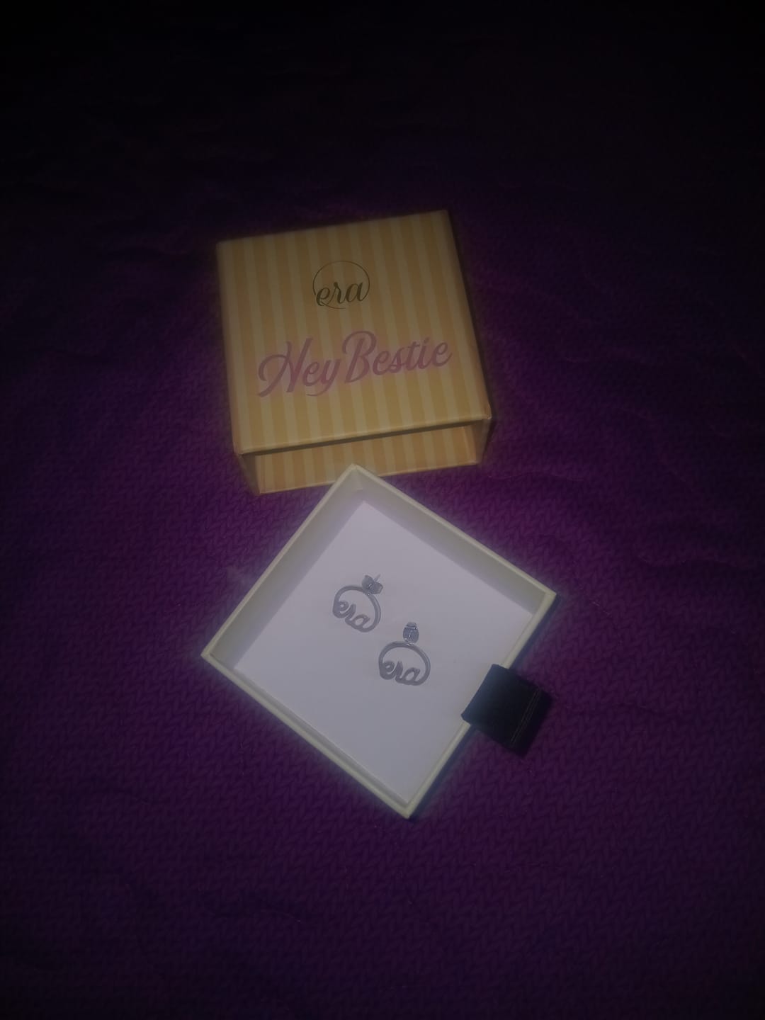 Customer photo review of Silver Era Logo Studs