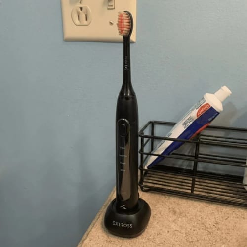 Customer photo review of Exy Red Light Toothbrush