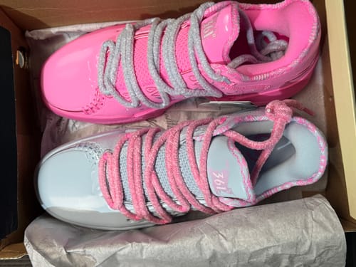 Customer's Joker 2 "Reverse" shoes in the box, showing the opposite pink and light grey colorway on the pair.