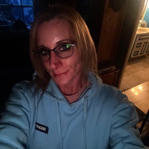 Customer wearing the light blue 80Eighty Limited Edition DCG87 Hoodie indoors.