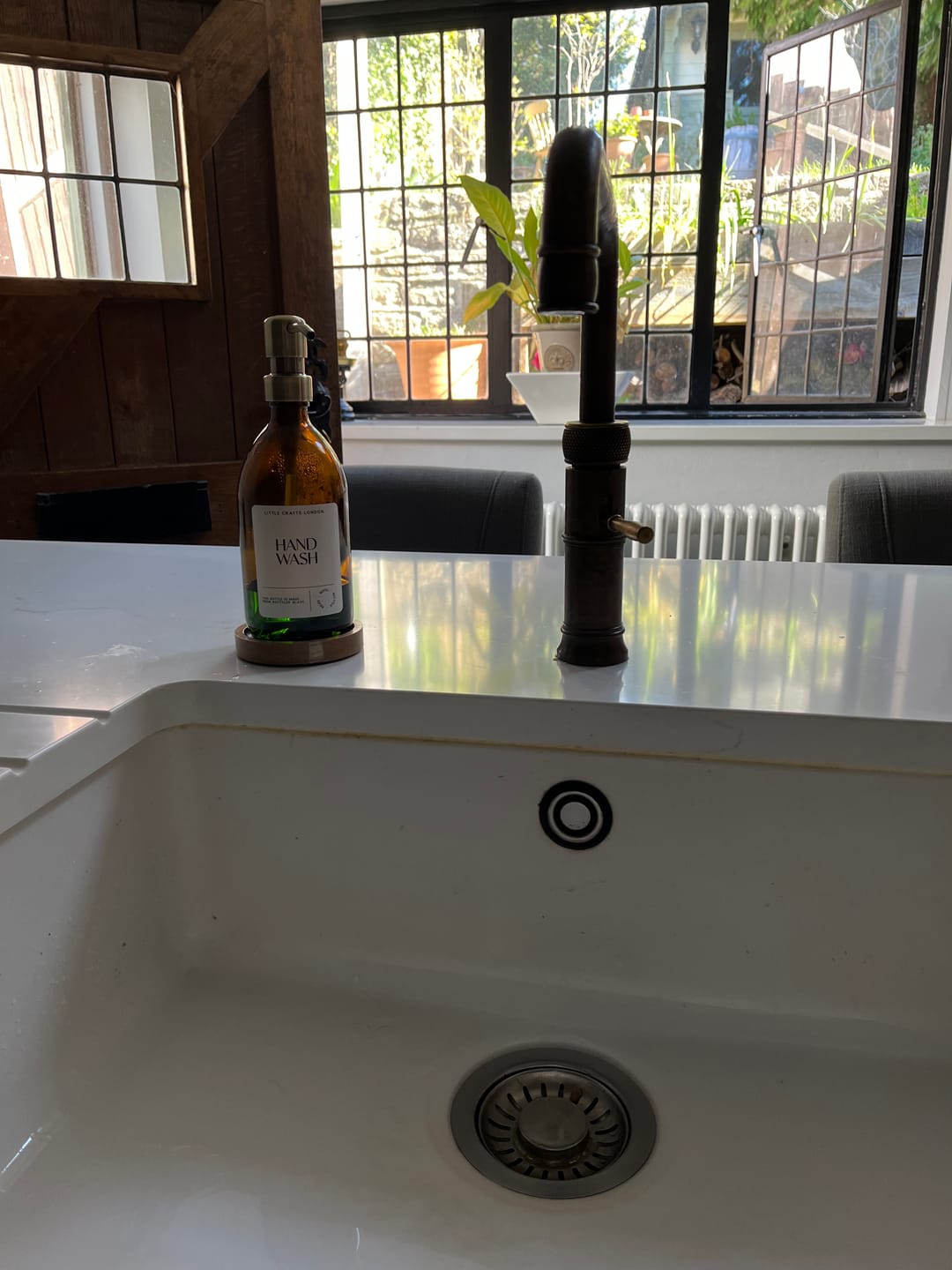Customer photo review of 500ml Amber Glass Bottle with Metal Pump White Label