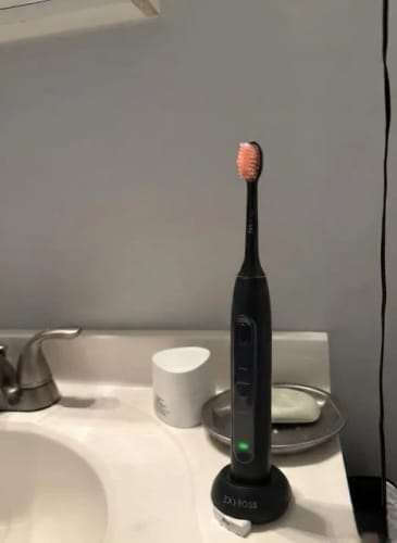 Customer photo review of Exy Red Light Toothbrush