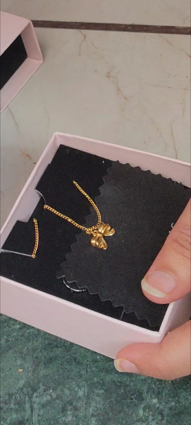 Customer photo review of Bow Pendant Necklace