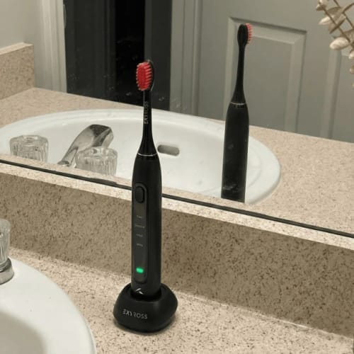 Customer photo review of Exy Red Light Toothbrush