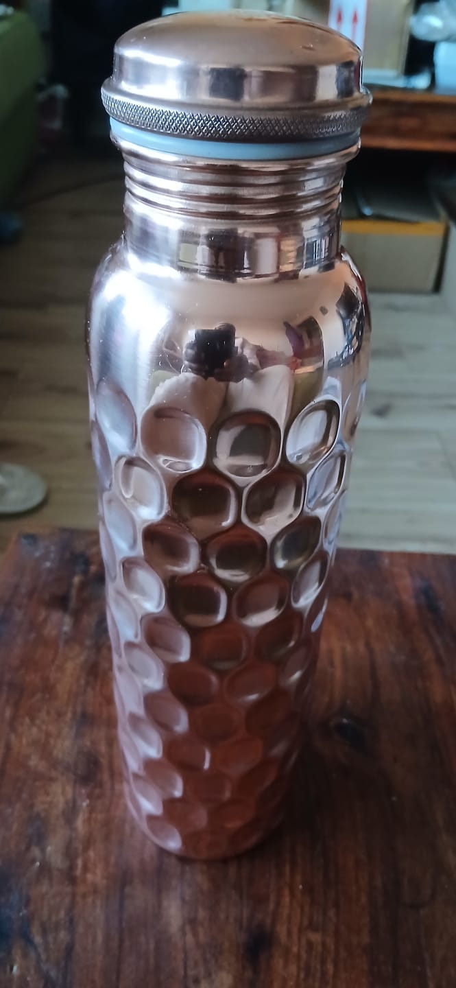 Customer photo review of Special Edition Diamond-Cut Honeycomb Copper Water Bottle | Textured Anti-Slip Grip