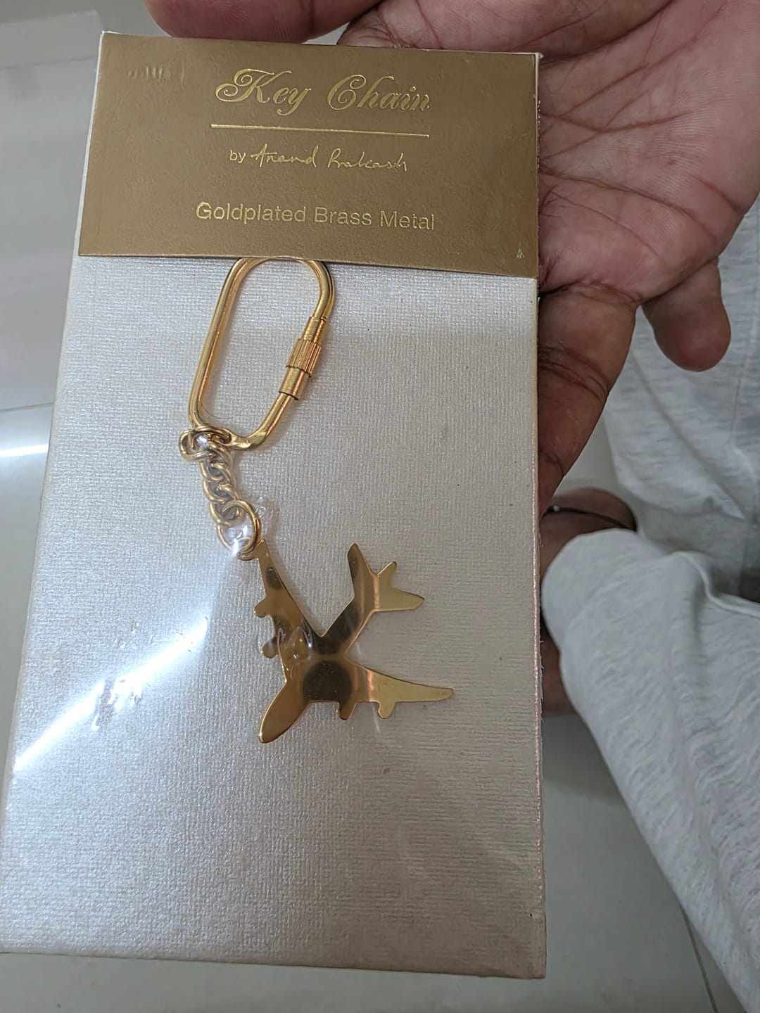 Customer photo review of Keychain Aeroplane - Goldplated