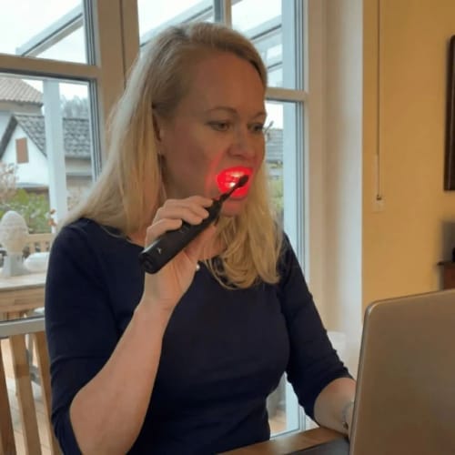 Customer photo review of Exy Red Light Toothbrush