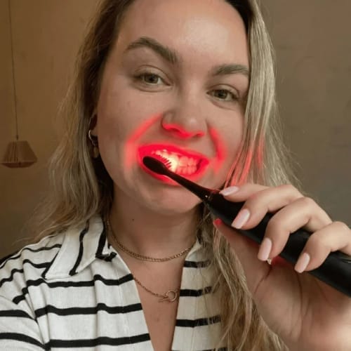 Customer photo review of Exy Red Light Toothbrush