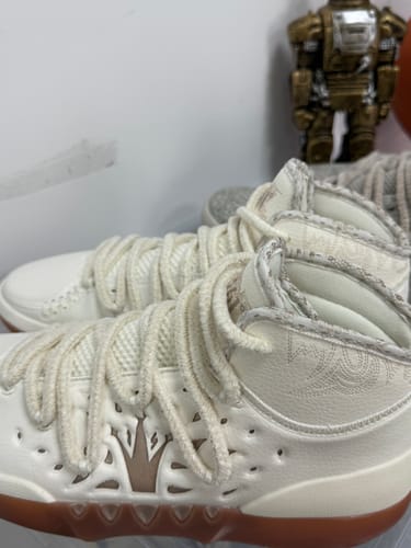 Close-up of a customer's white Joker 2 "MIRO" High shoes, showing the thick rope-like laces and detailed ankle collar.
