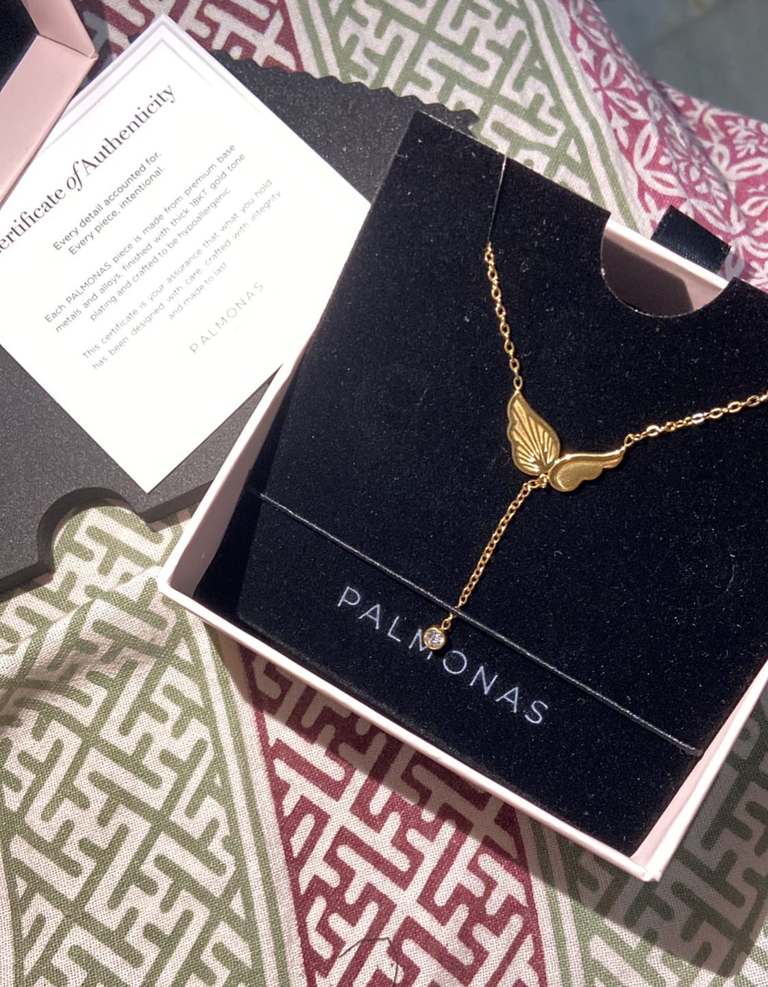 Customer photo review of Angel Wing Dangling Diamond Necklace