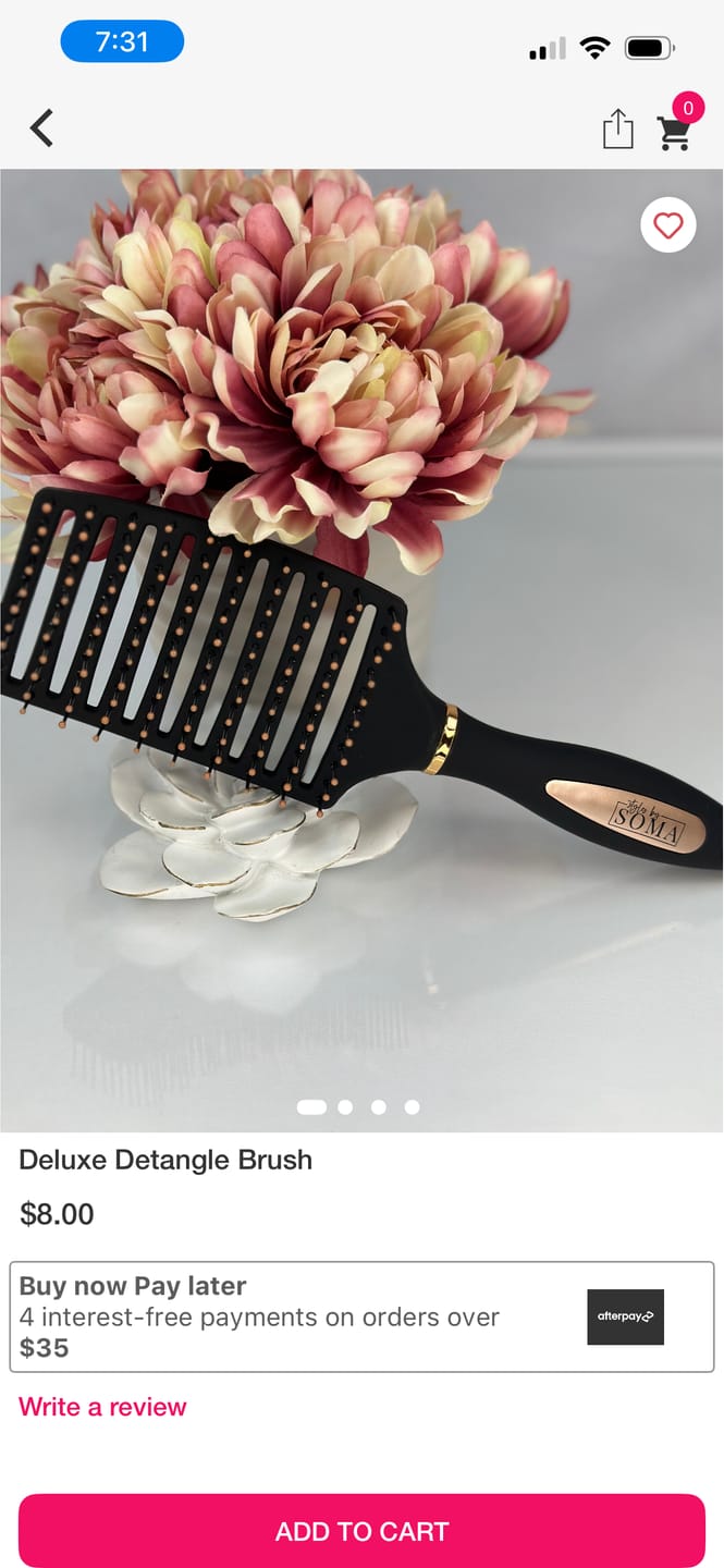 Customer photo review of Deluxe Detangle Brush