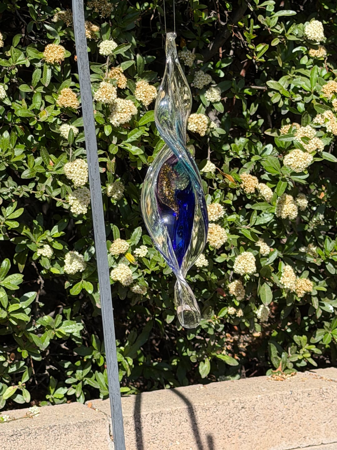 Customer photo review of Dichroic Spinner Suncatcher with Infused Cremains