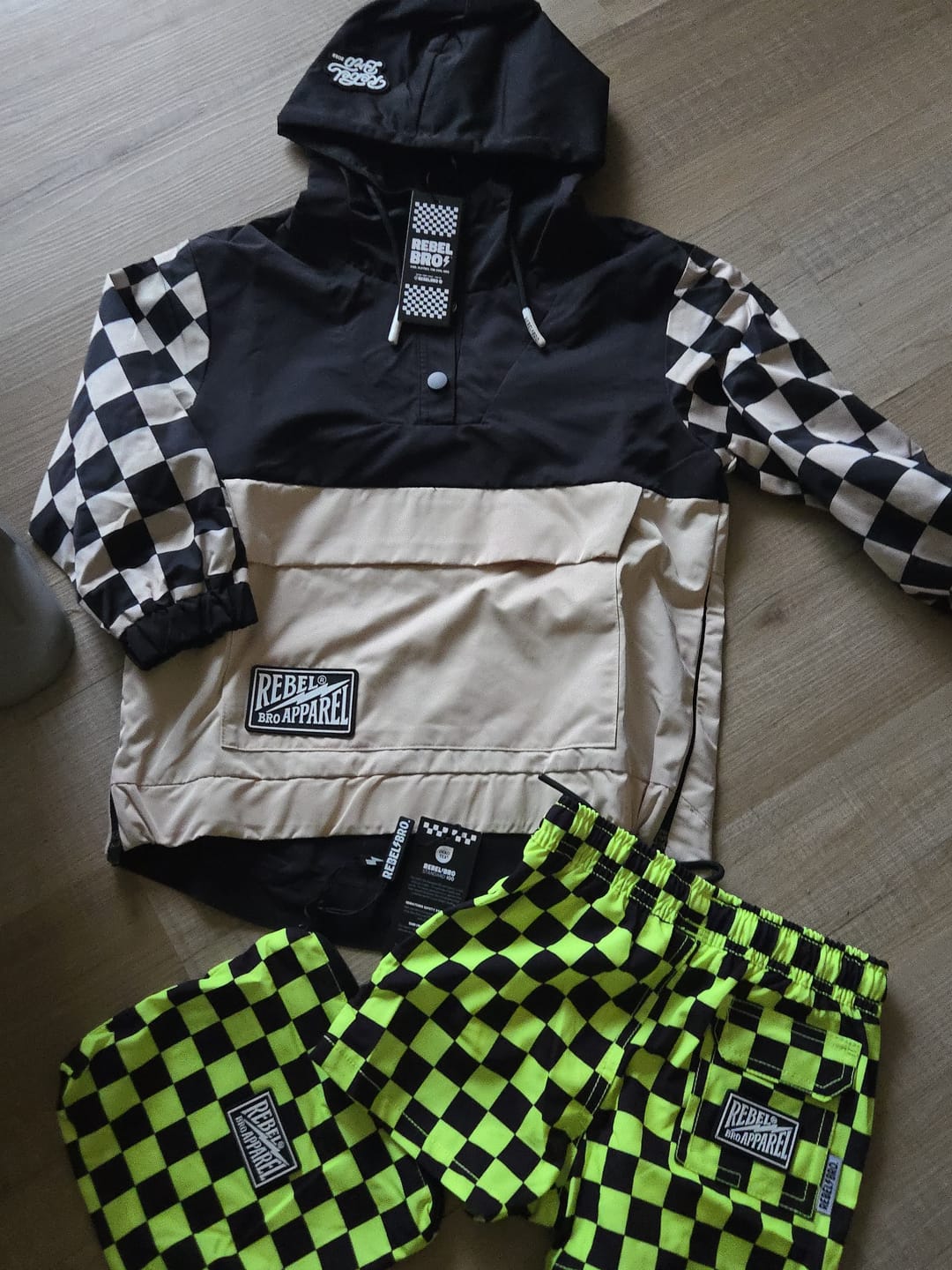 Customer photo review of Hybrid Swim Trunks in Neon Electric Lime + Black Checkered