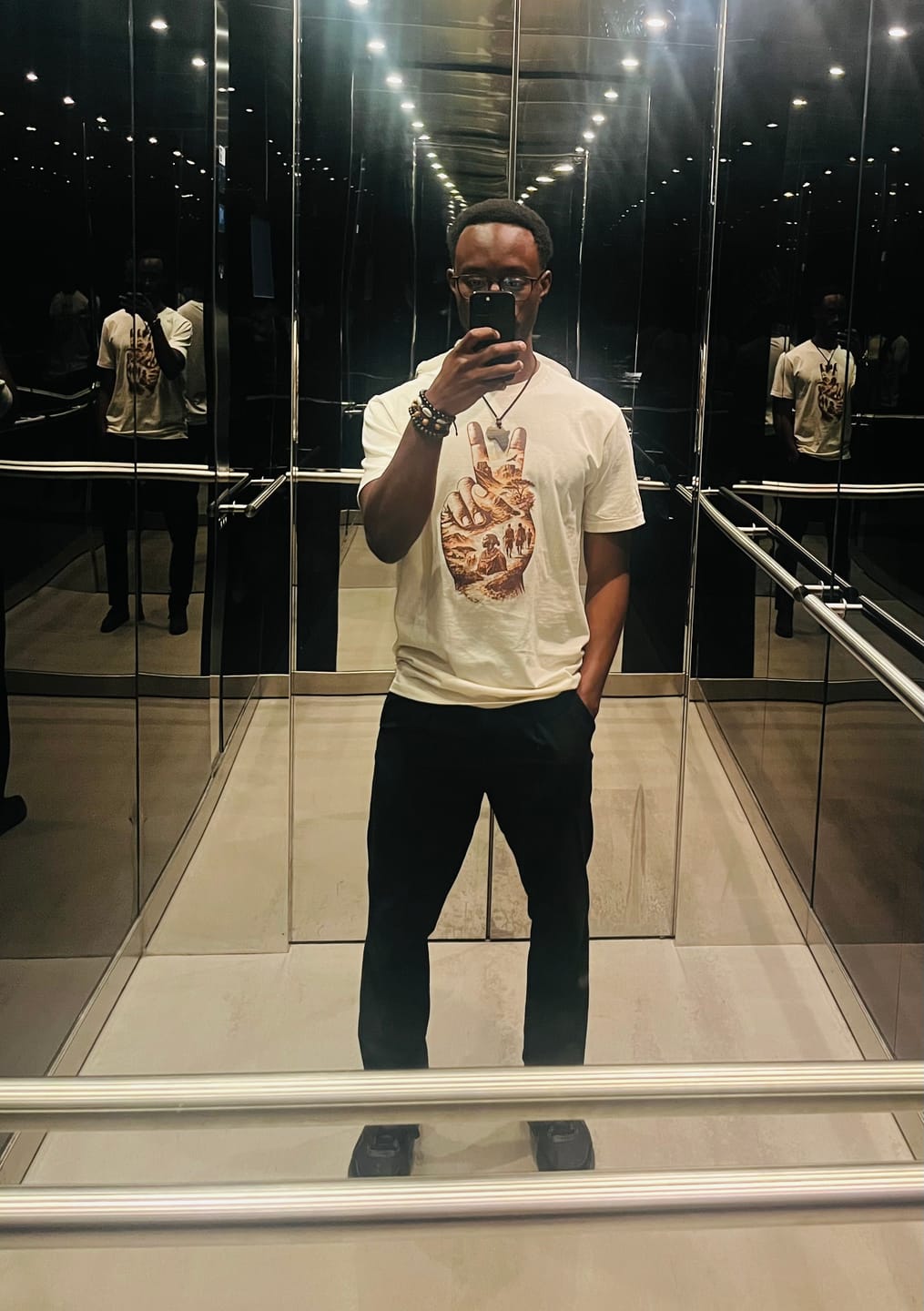 Customer photo review of Peace Through Africa Tee