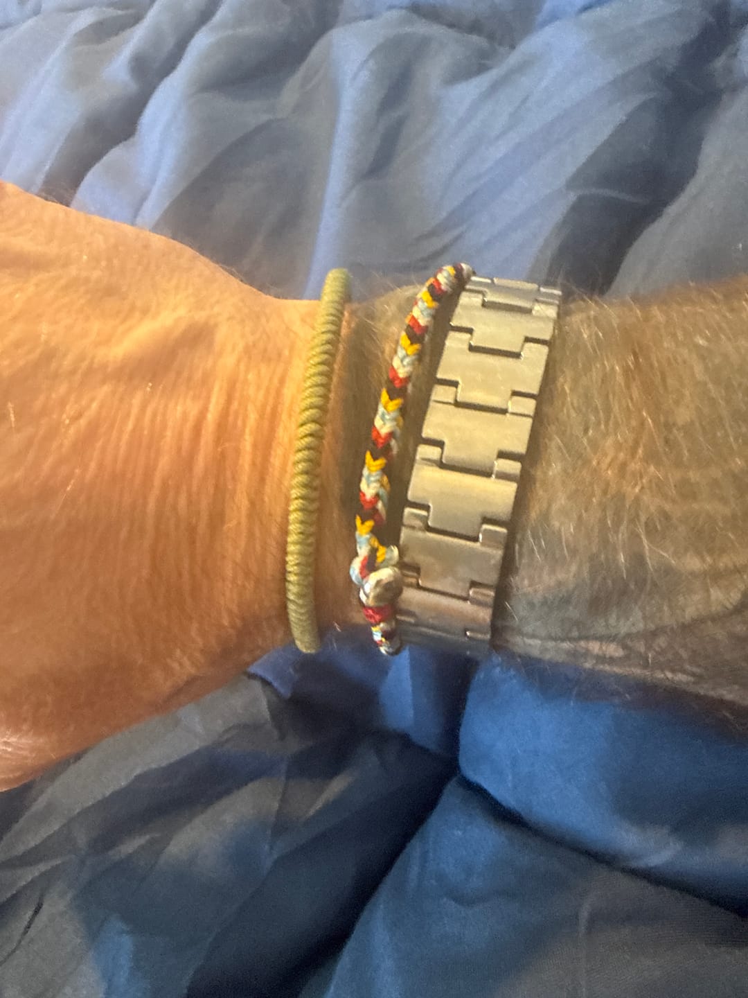 Customer photo review of Buddha Stones Tibet Handmade Five Color Thread Protection Braid String Bracelet