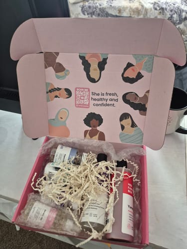 Customer's Balance Bundle 2.0 displayed in its open pink box with shredded paper filler.