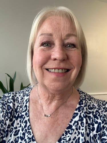 Customer smiling, showing the defined look of her lashes after applying My Amazing Lashes Mascara.