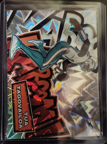 Customer's Basic Top Loader Card Holder protecting a shiny, holographic Tua Tagovailoa football card.