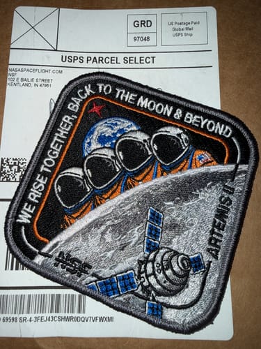 Customer's embroidered Artemis II - Collectors Patch resting on the shipping package it arrived in.