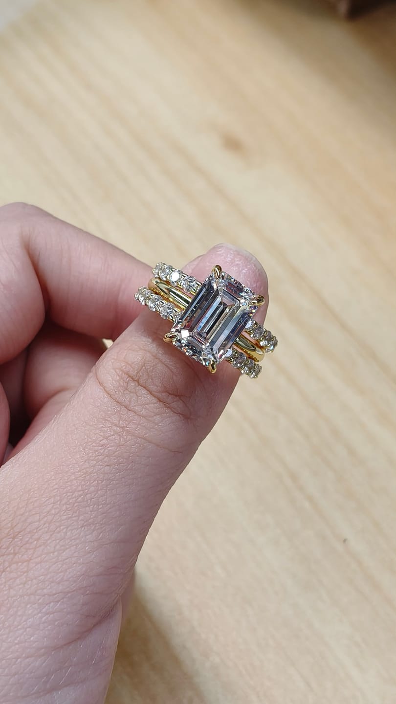 Customer photo review of 3PC 5.0Ct Emerald Cut Wedding Ring Set With Two Open Wedding Bands