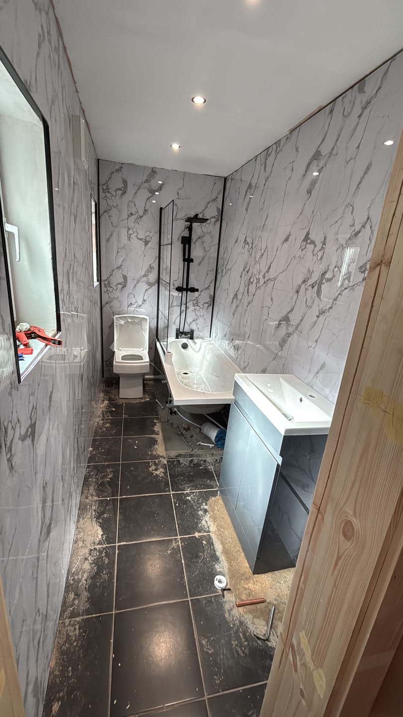 Customer photo review of Premium White Calacatta Gloss Shower Wall Panel – 1M x 2.4M