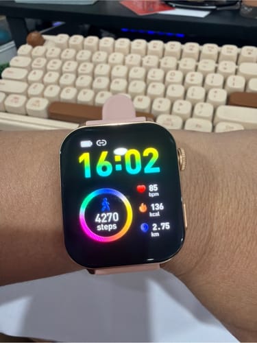 Customer wearing the Gard Pro Health Smartwatch 3, showing the bright, colorful display with fitness tracking metrics.