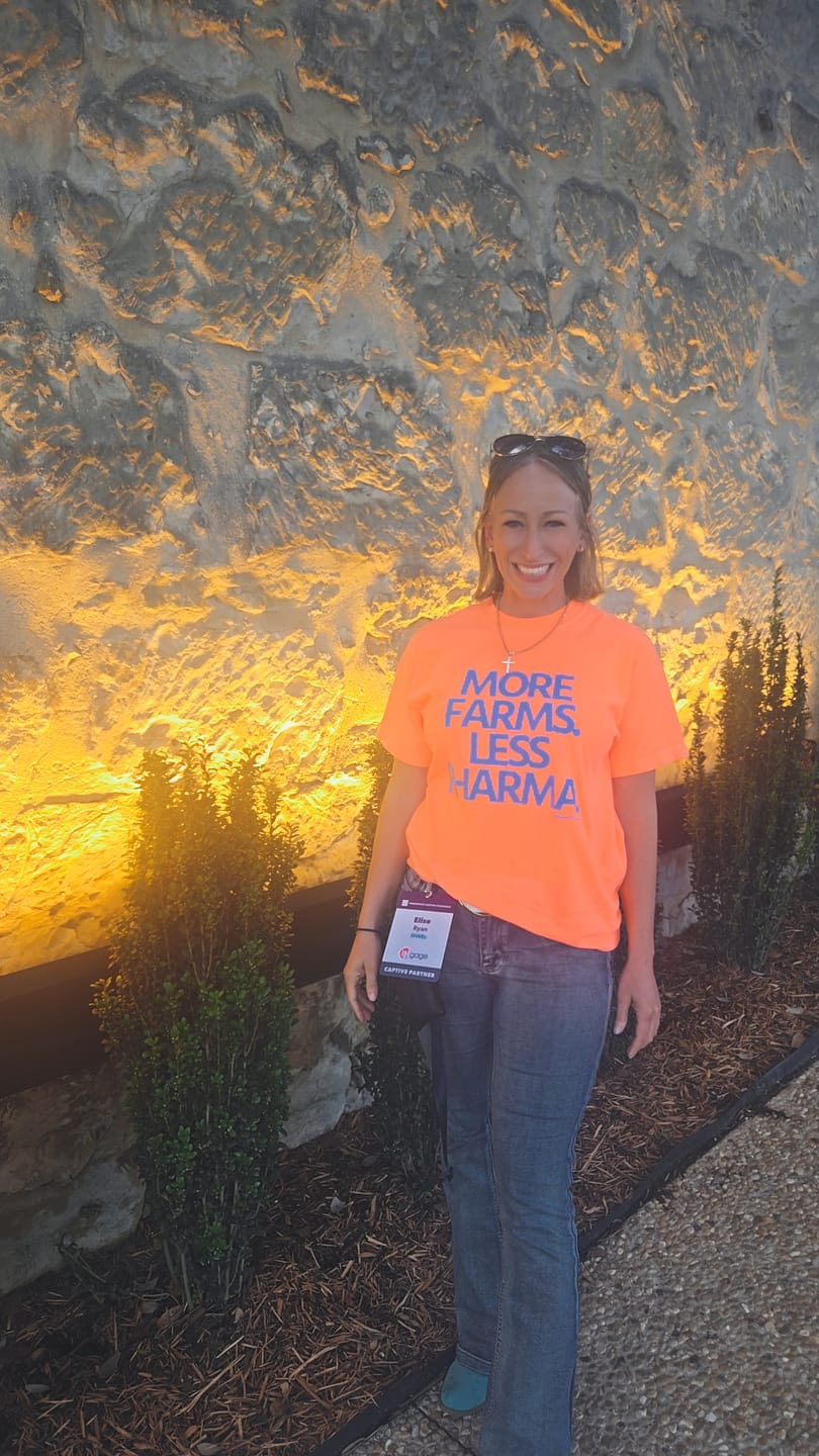Customer photo review of 'More Farms. Less Pharma.' Neon Orange Tee