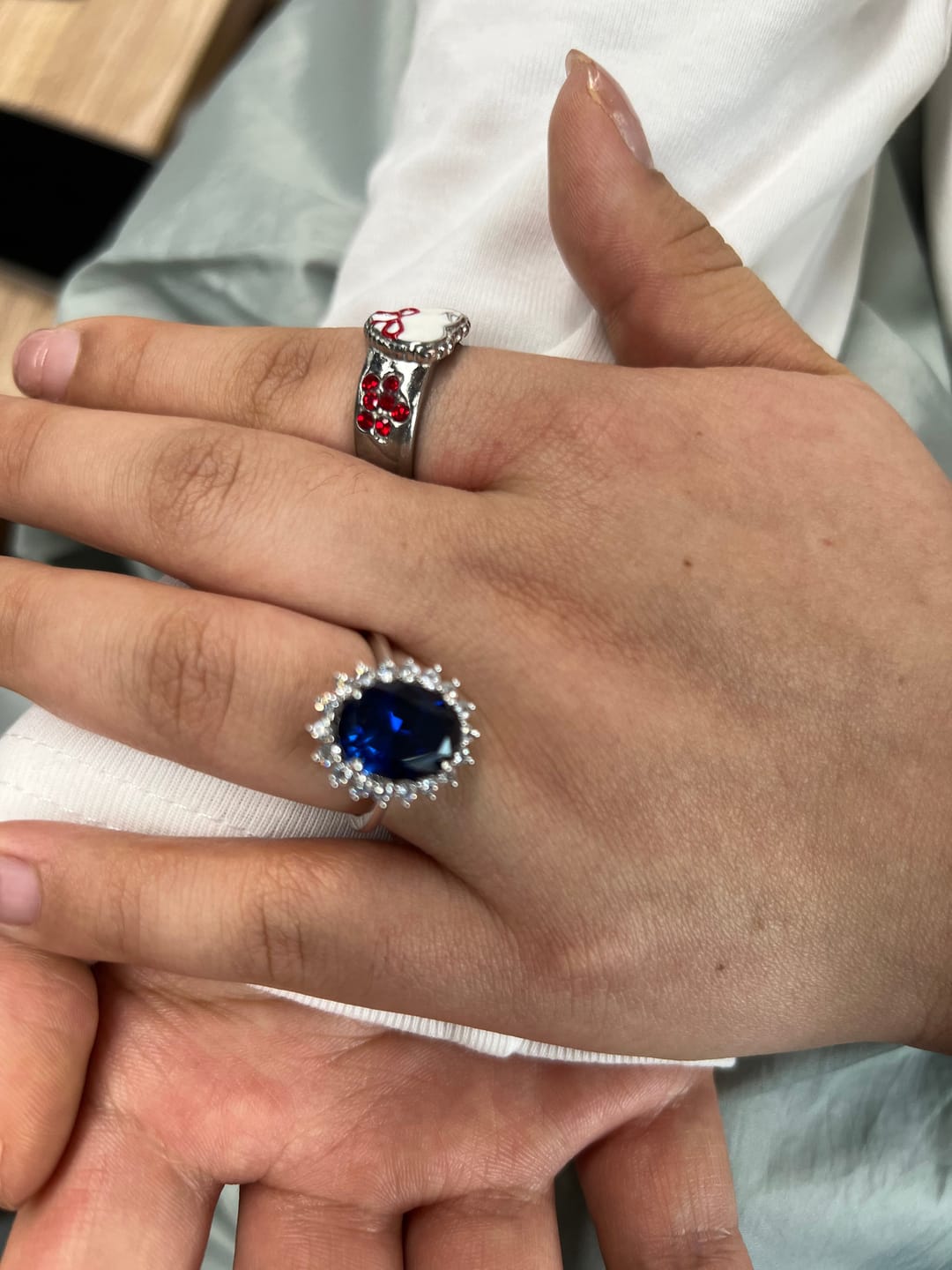 Customer photo review of 4.5 Carat Halo Oval Cut Blue/Red/Green/Yellow Sapphire Engagement Ring In Sterling Silver