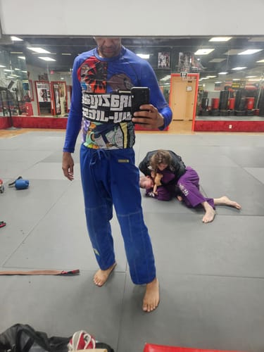 Customer photo review of Grapple Theft Arts Premium Rash Guard For Men/Women