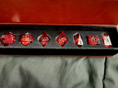 Customer photo review of Blood Red Glitter Liquid Core Handmade Resin DND Dice Set