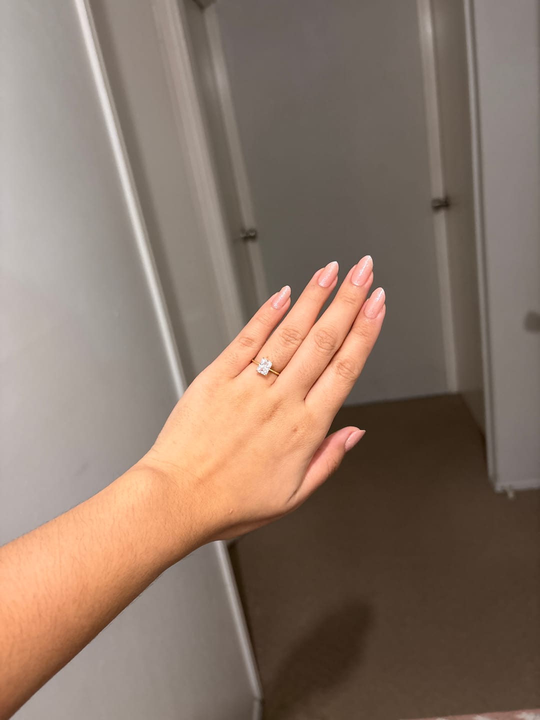 Customer photo review of The Maya Emerald Sapphire Engagement Ring