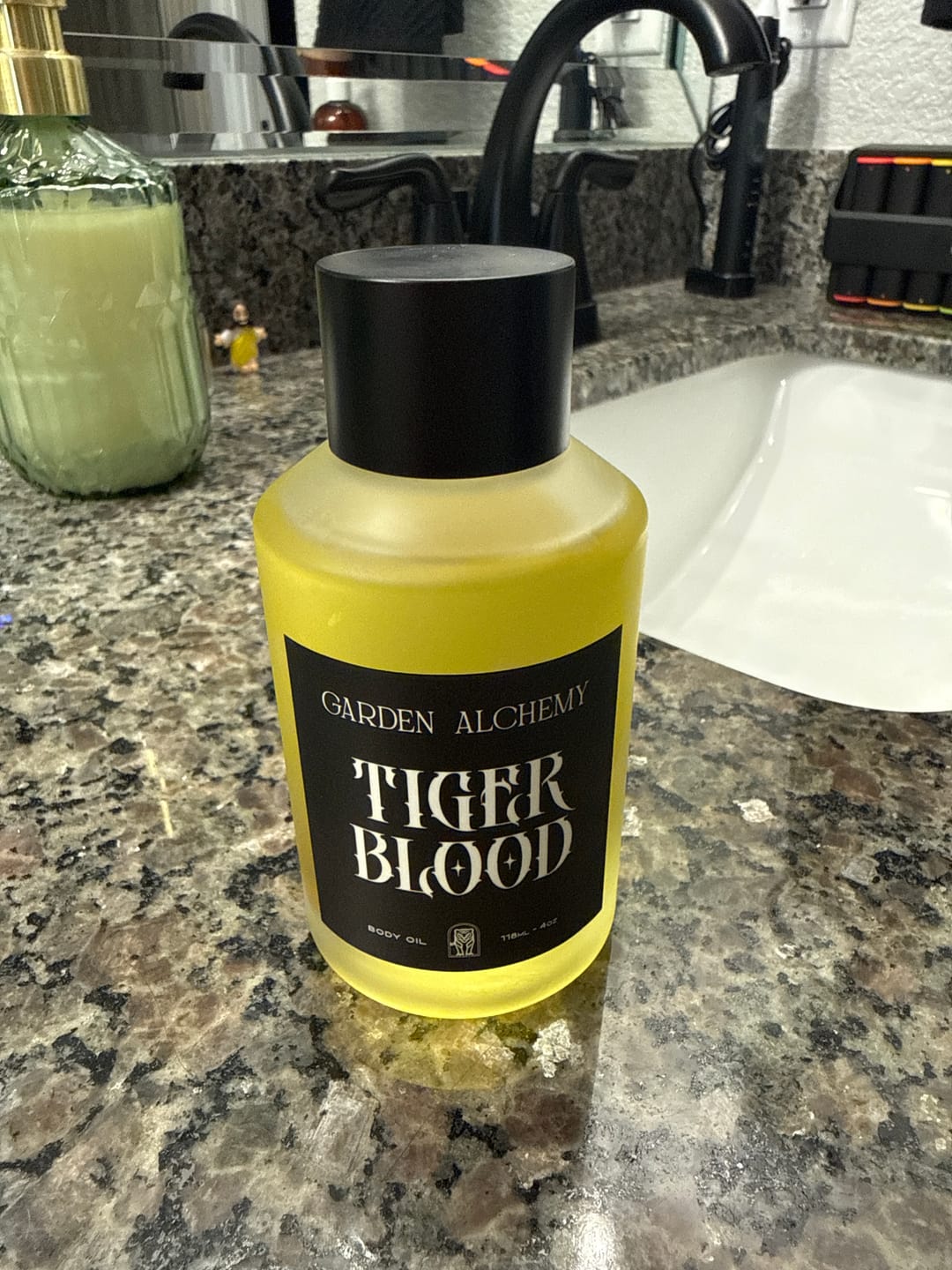 Customer photo review of TIGER BLOOD BODY OIL