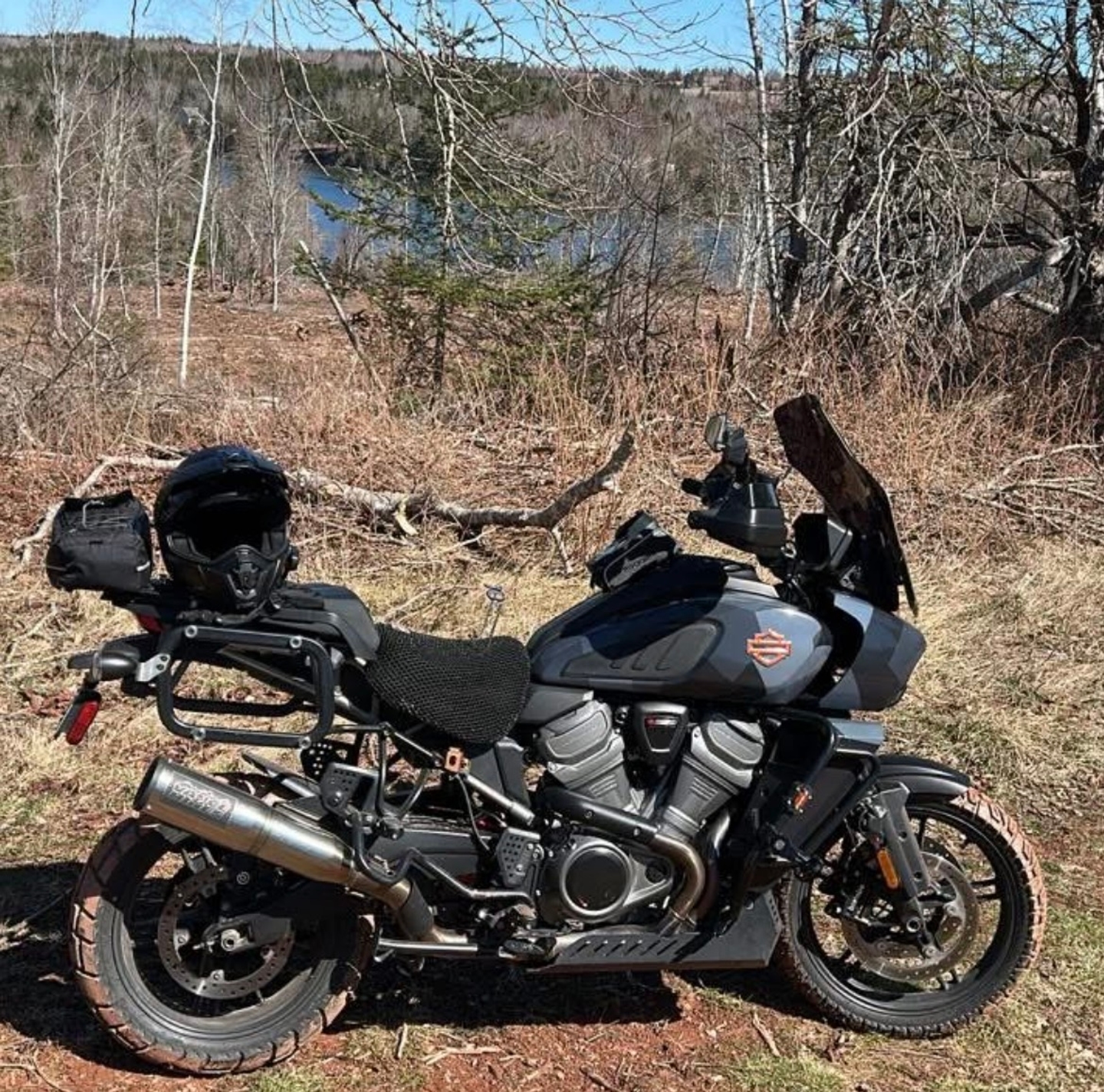 Wind Rider 3D mesh seat cover on a Harley Road Glide showing raised honeycomb airflow surface at a roadside pull-off